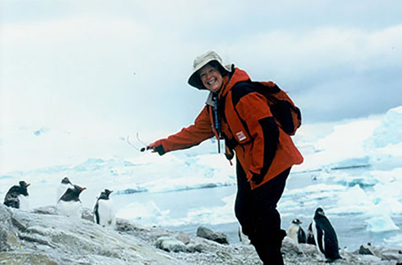 Janice Jensen in Antarctica with Penguins