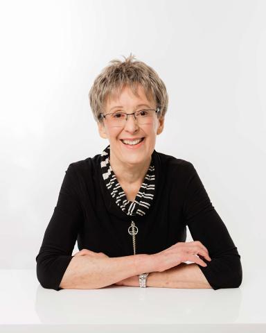 Janice Jensen Author photo - black shirt on white background (web-resolution 1)